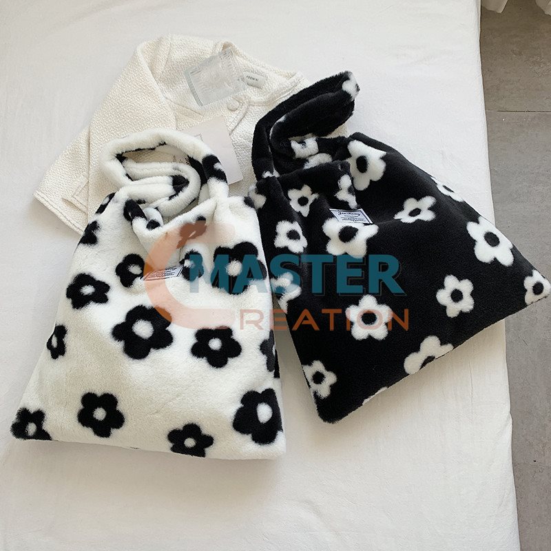 White and Black Furry Bag